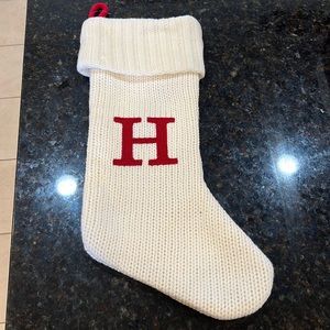 H monogram knitted stocking